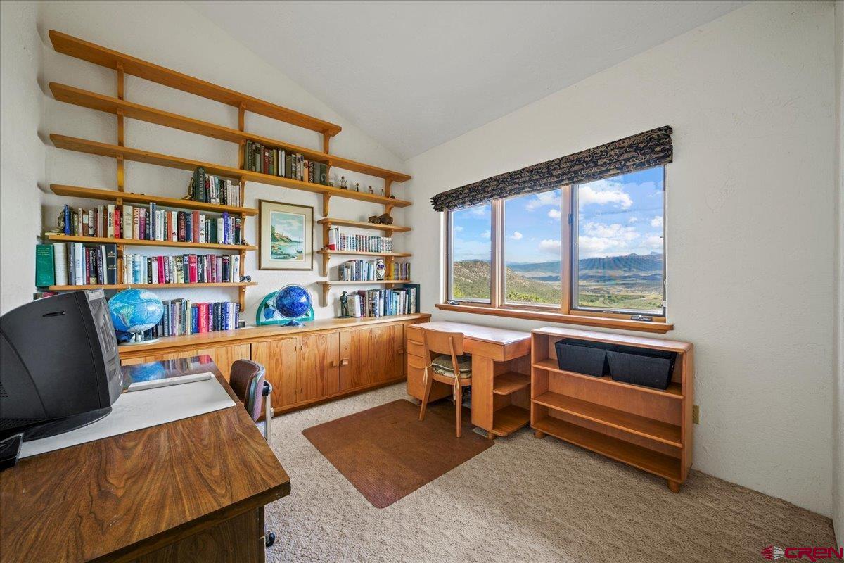 12979 County Road 1 Ridgway, CO 81432 - Photo 24 of 35 a living room with furniture and a window