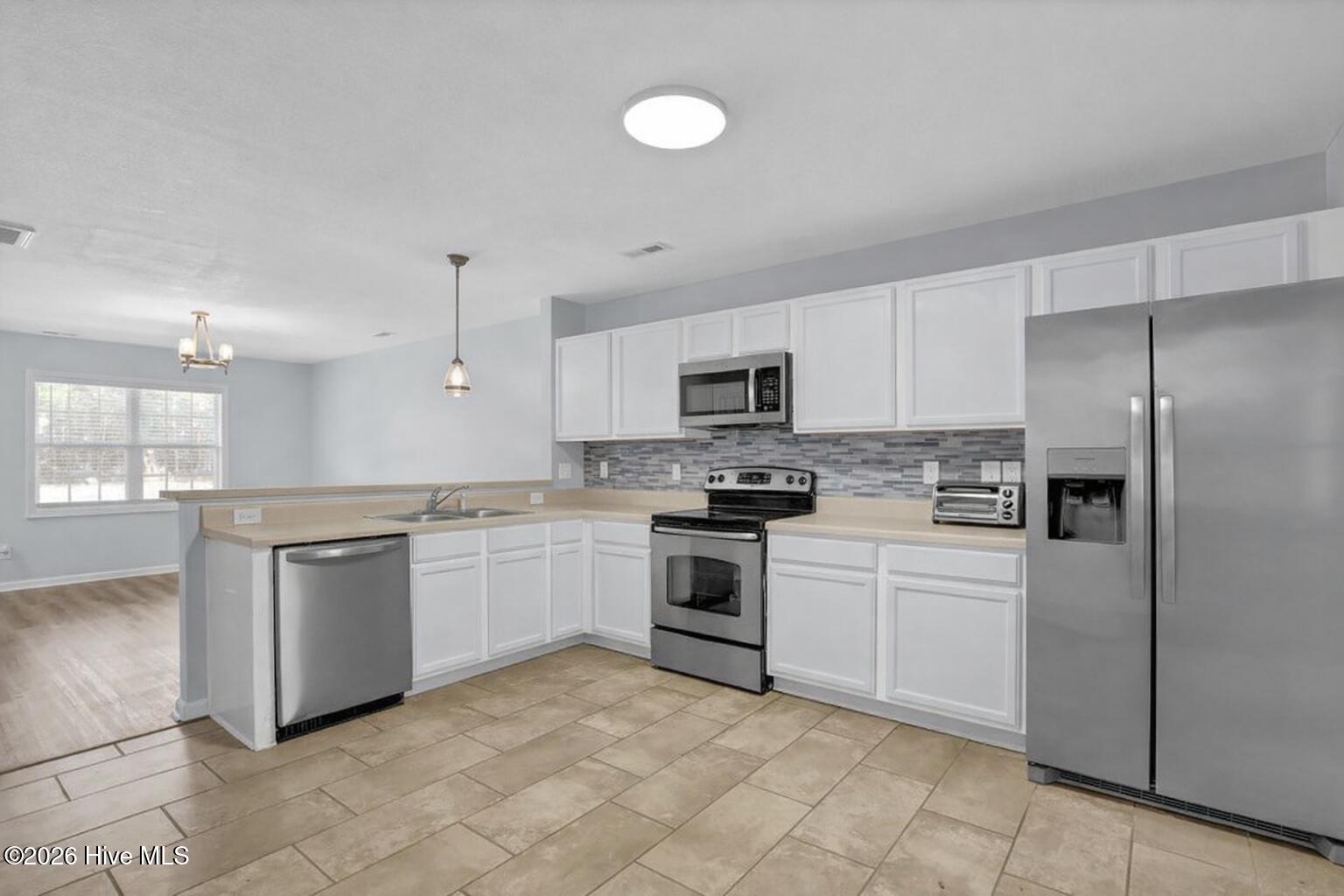 1404 Old Folkstone Road, Unit 2 Sneads Ferry, NC 28460 - Photo 15 of 30 ChatGPT Image Jan 22, 2026, 11_34_03 AM