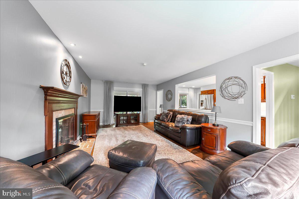 686 Limehouse Road Wayne, PA 19087 - Photo 7 of 51 a living room with furniture and a flat screen tv