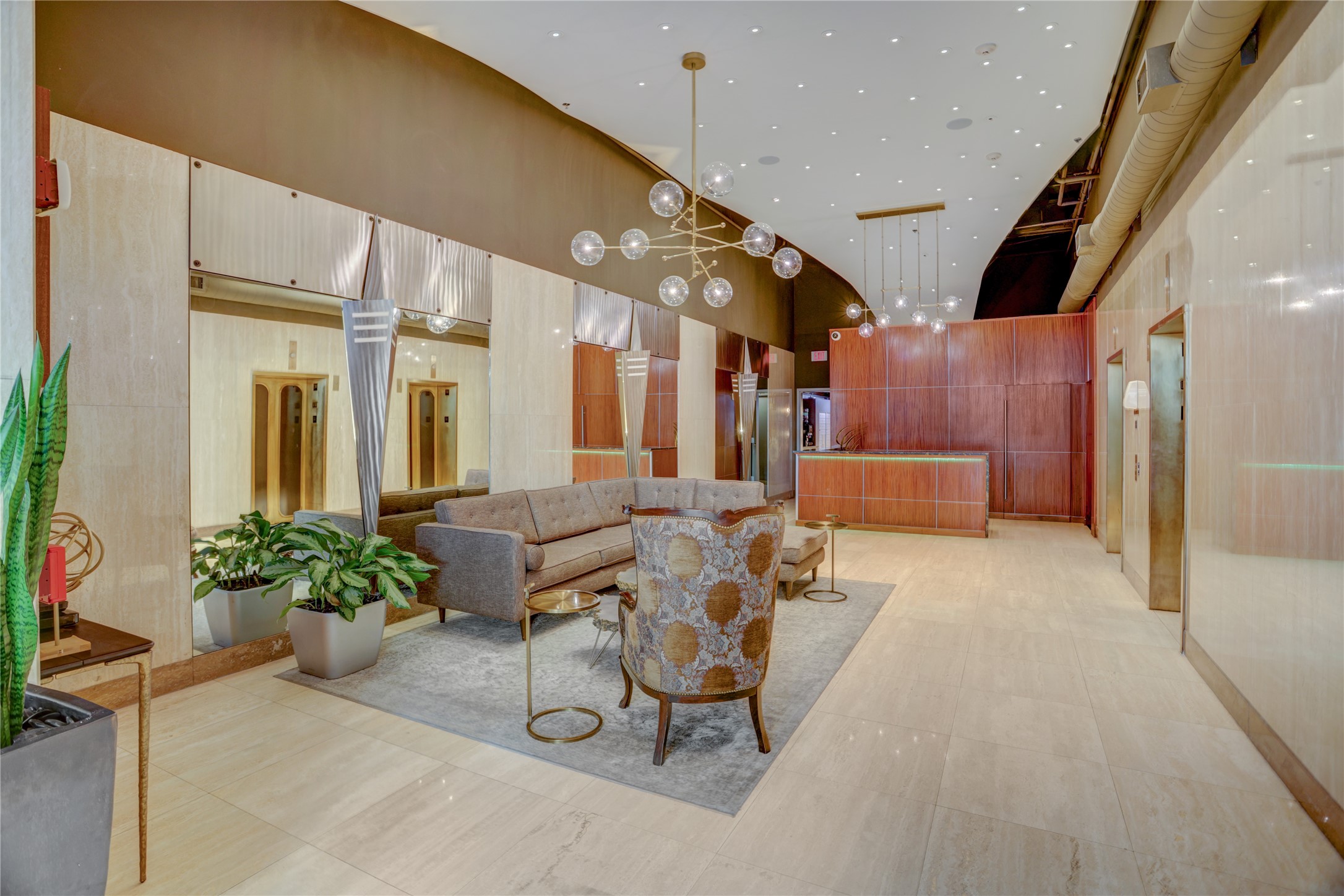 917 Main Street, Unit 1107 Houston, TX 77002 - Photo 20 of 33 a lobby with furniture and a potted plant