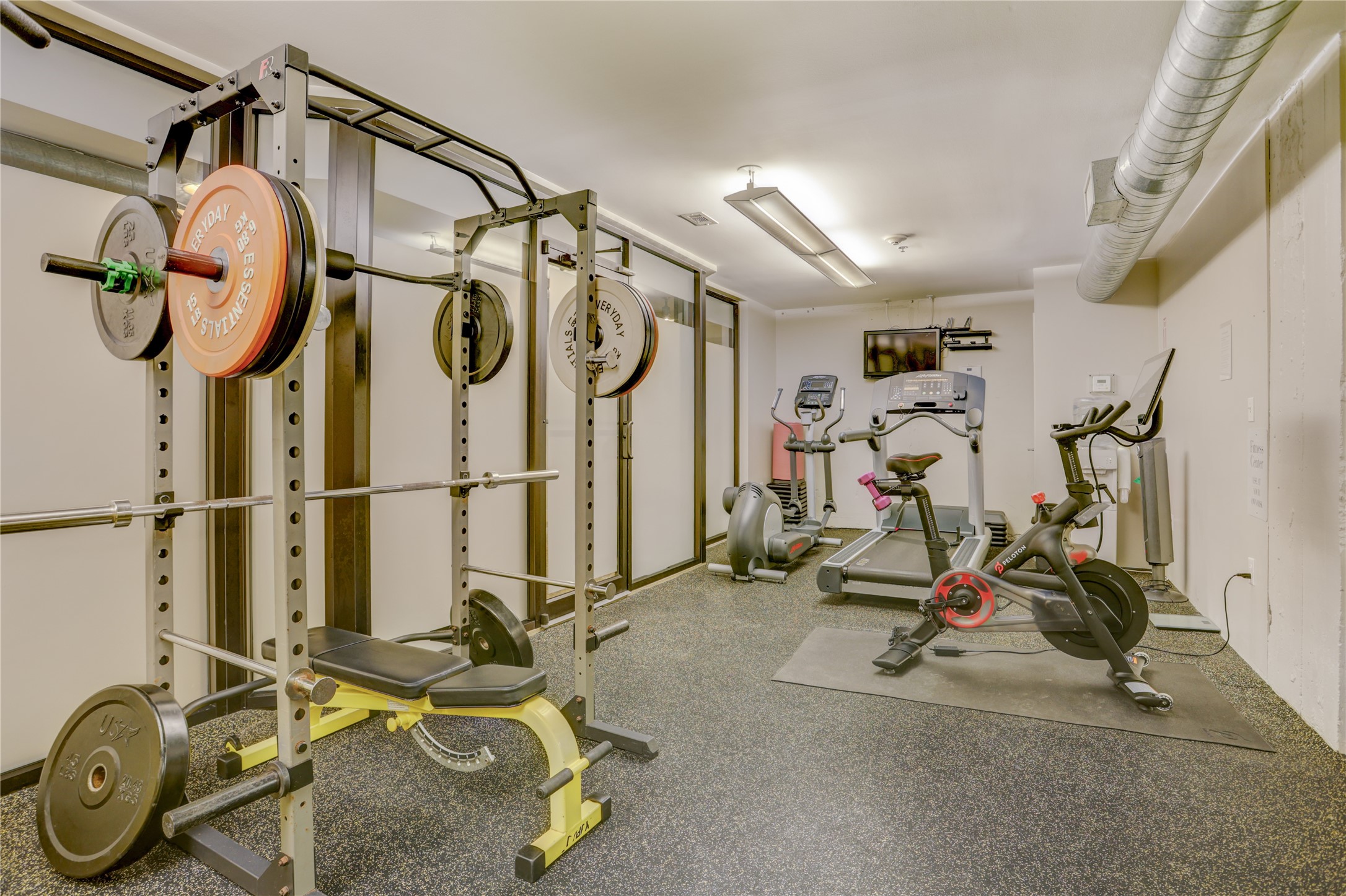 917 Main Street, Unit 1107 Houston, TX 77002 - Photo 23 of 33 a view of a room with gym equipment