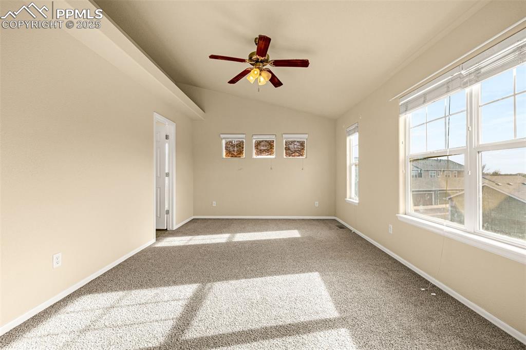 3597 Grey Owl Point Colorado Springs, CO 80916 - Photo 23 of 42 a view of empty room with wooden floor and fan