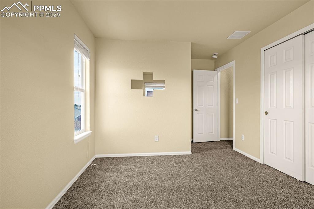 3597 Grey Owl Point Colorado Springs, CO 80916 - Photo 33 of 42 a view of an empty room