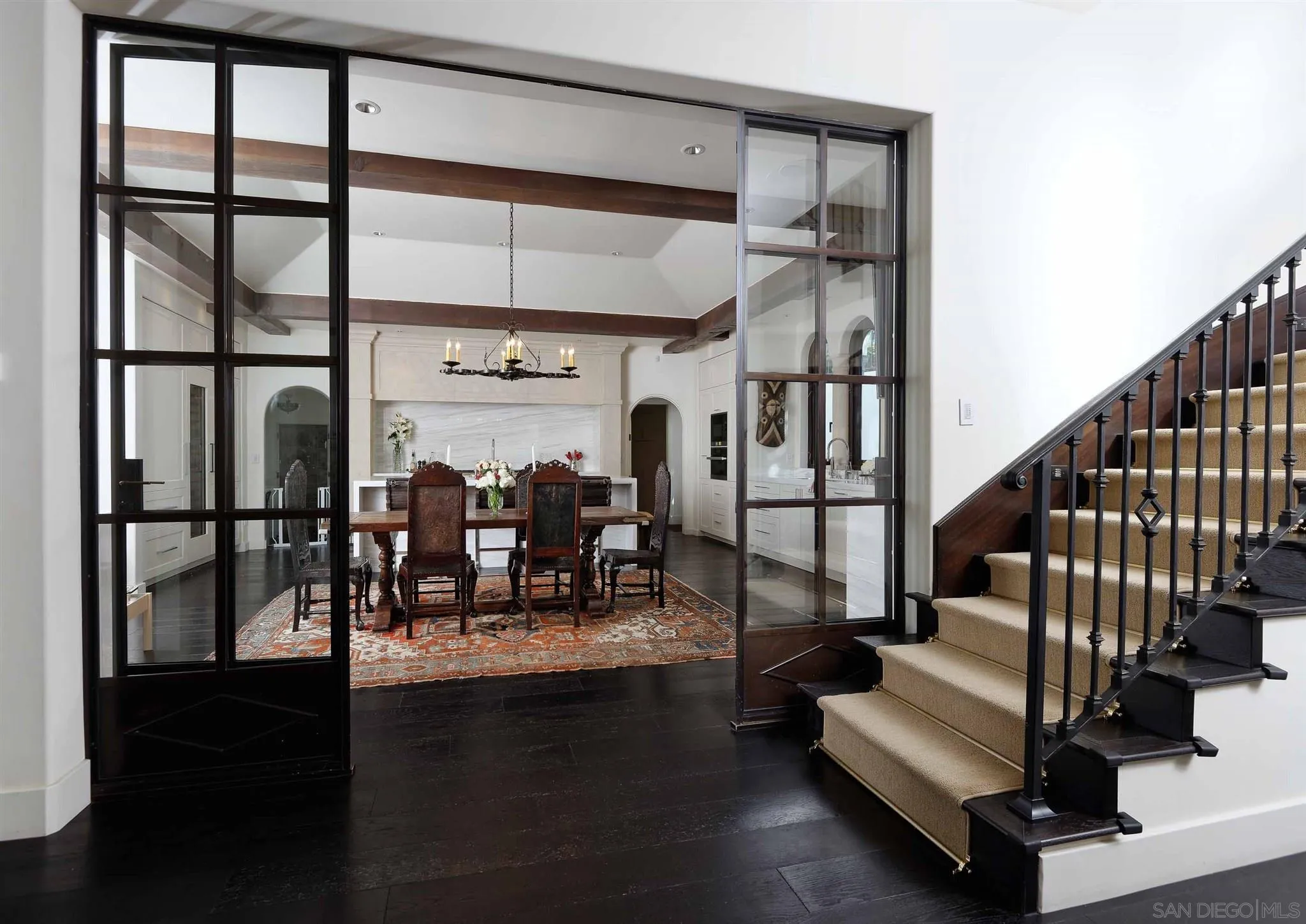7907 Princess Street La Jolla, CA 92037 - Photo 21 of 41 a view of entryway and hall with dining room