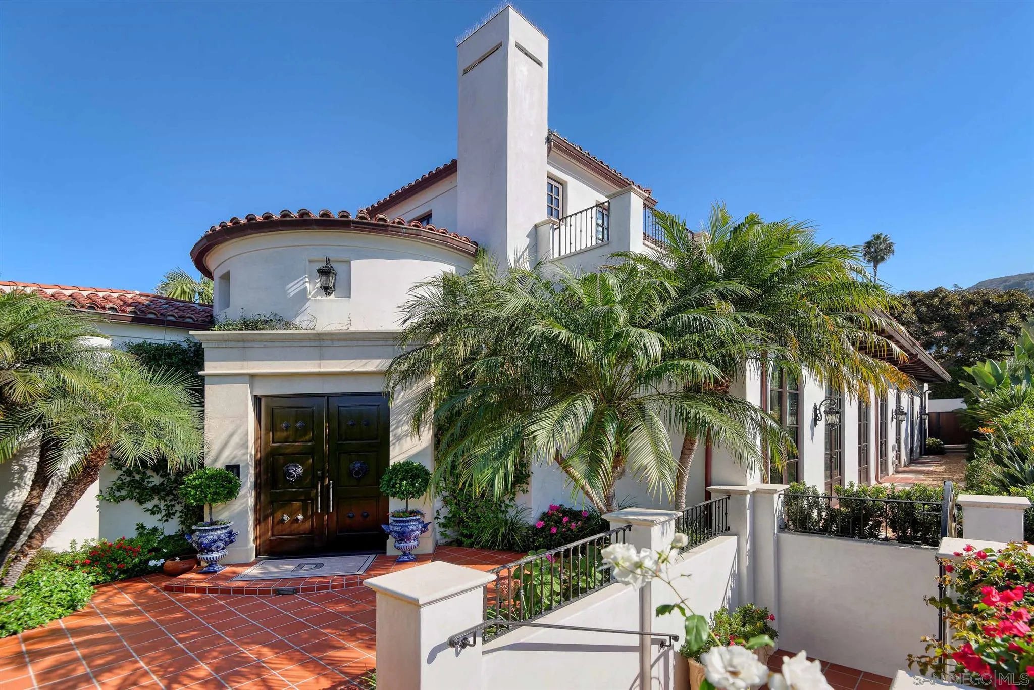 7907 Princess Street La Jolla, CA 92037 - Photo 3 of 41 a front view of a house with balcony