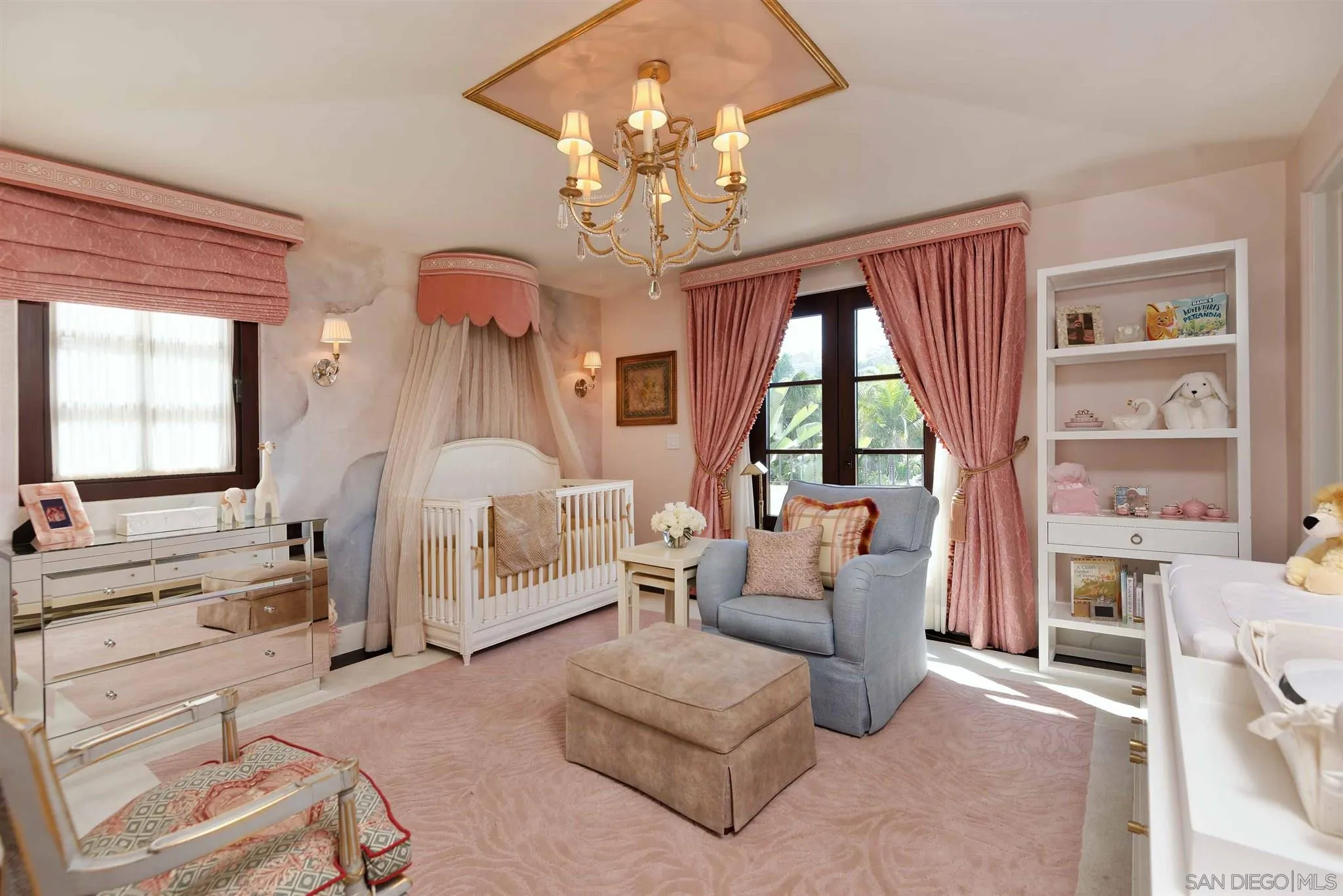 7907 Princess Street La Jolla, CA 92037 - Photo 35 of 41 a living room with furniture a chandelier and a large window