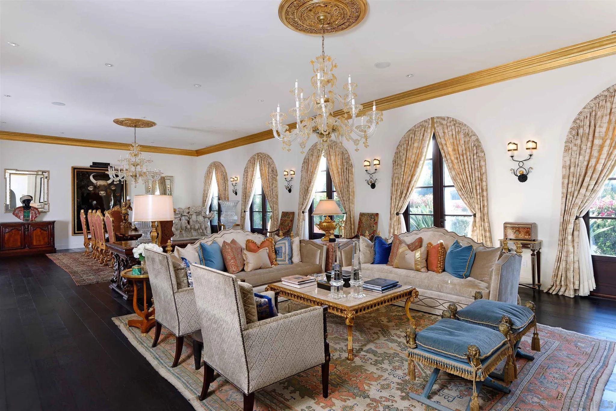 7907 Princess Street La Jolla, CA 92037 - Photo 6 of 41 a living room with patio furniture and a chandelier