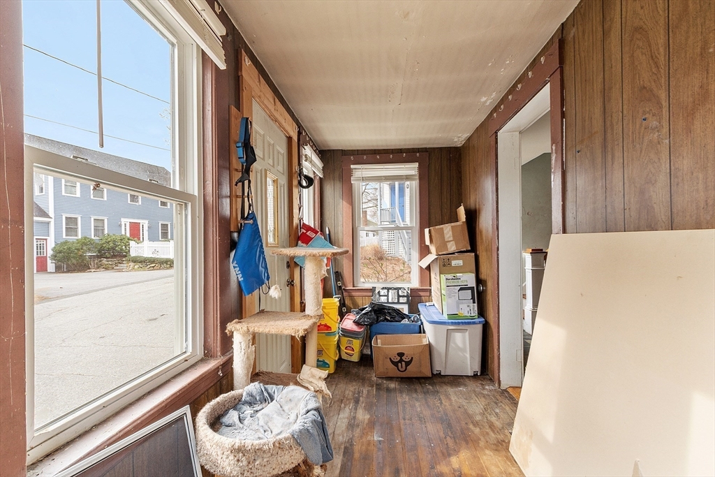 17 Prospect Street Maynard, MA 01754 - Photo 11 of 30 a room with furniture and a window