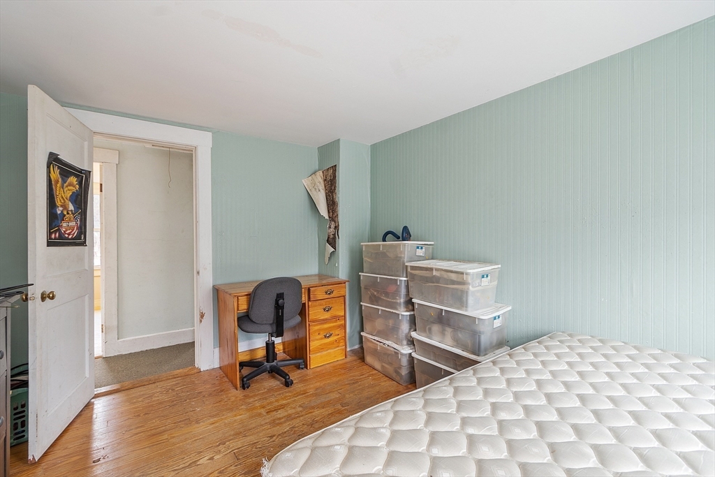 17 Prospect Street Maynard, MA 01754 - Photo 15 of 30 a bedroom with furniture and a window