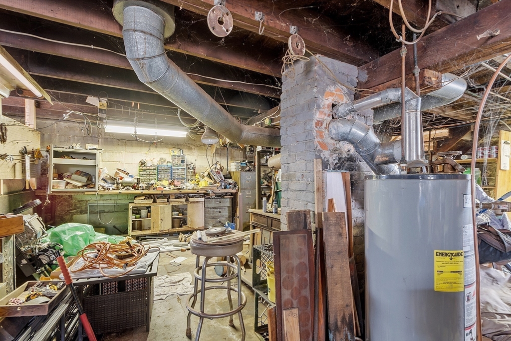 17 Prospect Street Maynard, MA 01754 - Photo 22 of 30 a view of a chairs and table in a patio