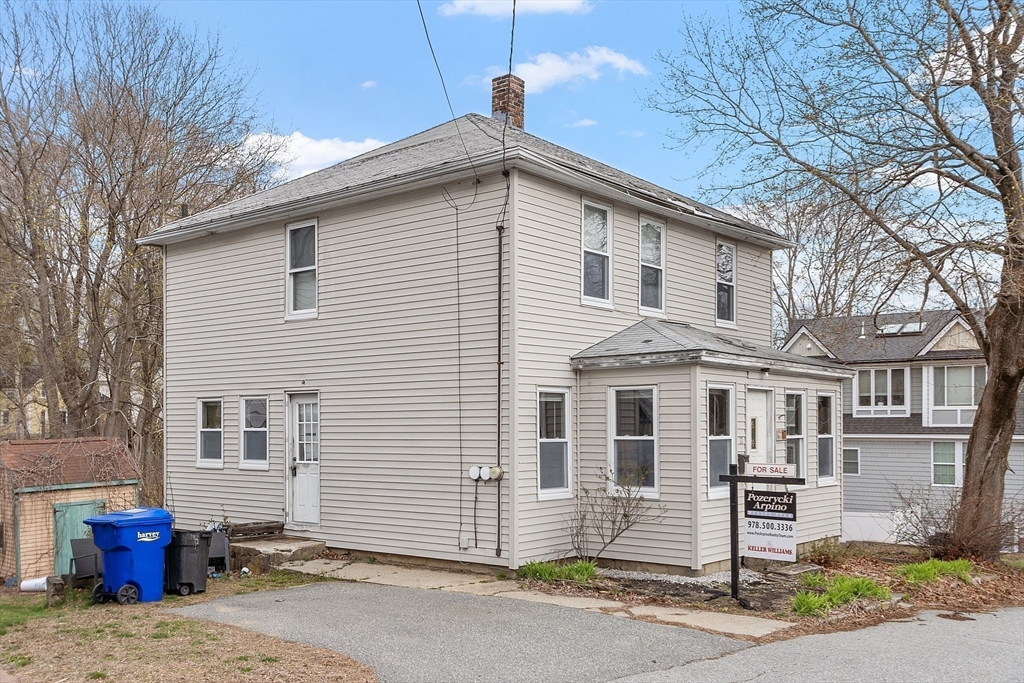 17 Prospect Street Maynard, MA 01754 - Photo 29 of 30 a view of a house with a tree