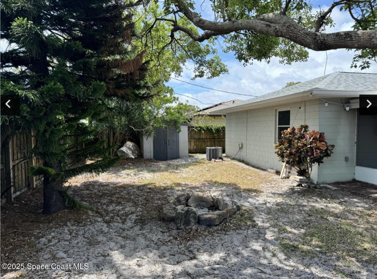 753 Tupelo Drive Melbourne, FL 32935 - Photo 12 of 12 a view of a house with a yard