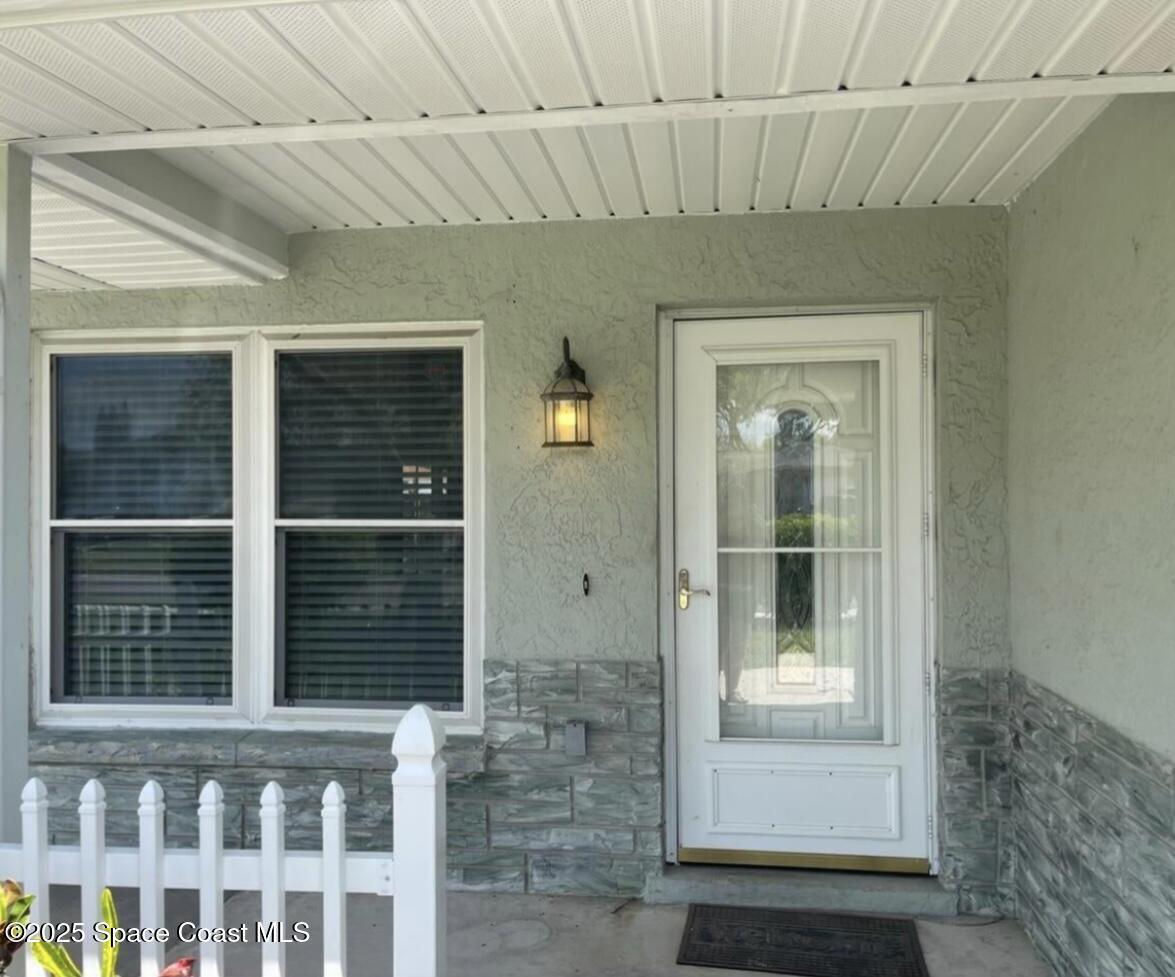 753 Tupelo Drive Melbourne, FL 32935 - Photo 2 of 12 a view of a porch