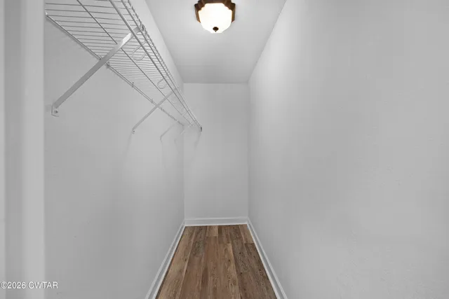 a view of wooden floor in a bathroom