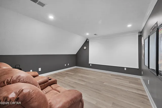 a bedroom with a bed and closet