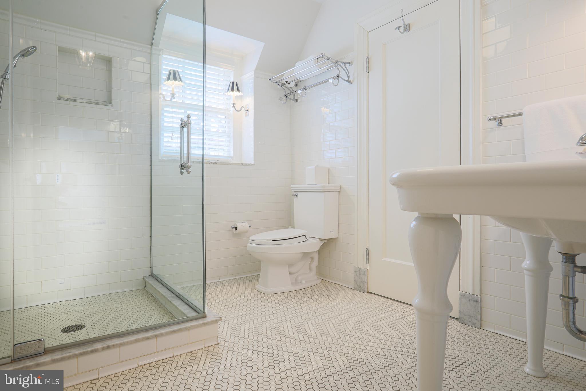 5502 Roland Avenue Baltimore, MD 21210 - Photo 26 of 47 Hall Bath-subway tile, whimsical lighting
