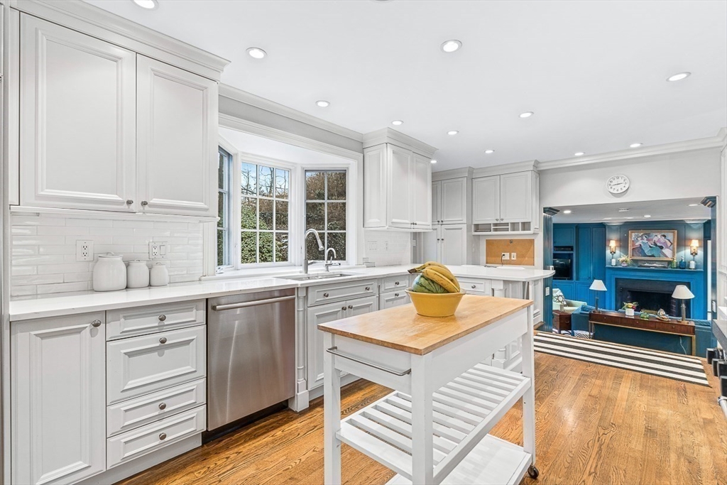 14 Rockridge Road Wellesley, MA 02481 - Photo 16 of 42 a kitchen with a sink stove and cabinets