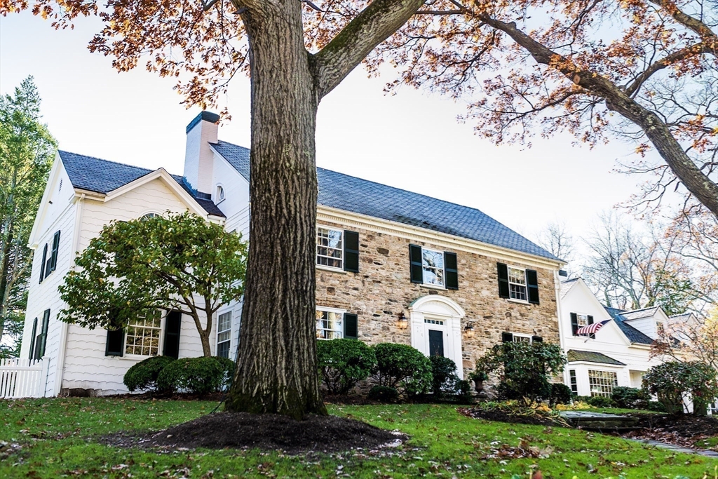 14 Rockridge Road Wellesley, MA 02481 - Photo 2 of 42 front view of a house with a garden
