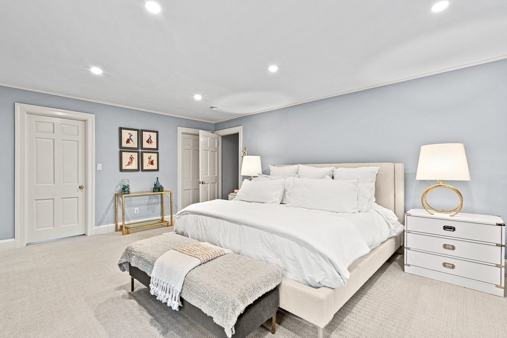 14 Rockridge Road Wellesley, MA 02481 - Photo 27 of 42 a bedroom with a bed and a dresser