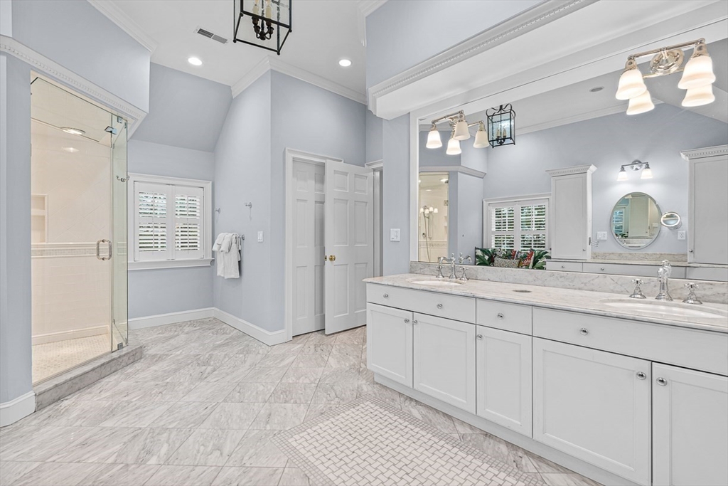 14 Rockridge Road Wellesley, MA 02481 - Photo 30 of 42 a spacious bathroom with a double vanity sink shower and a mirror