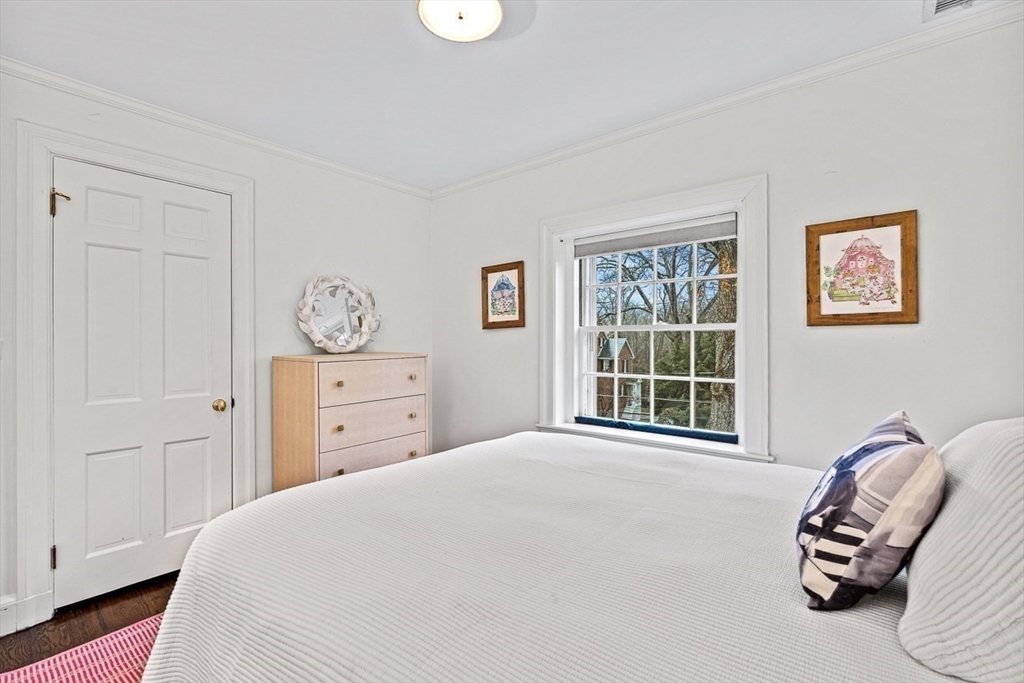 14 Rockridge Road Wellesley, MA 02481 - Photo 34 of 42 a bedroom with a bed and a window