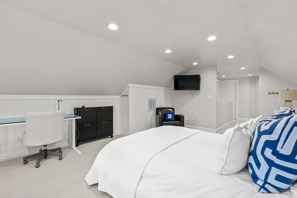 14 Rockridge Road Wellesley, MA 02481 - Photo 39 of 42 a bed room with a bed and a television