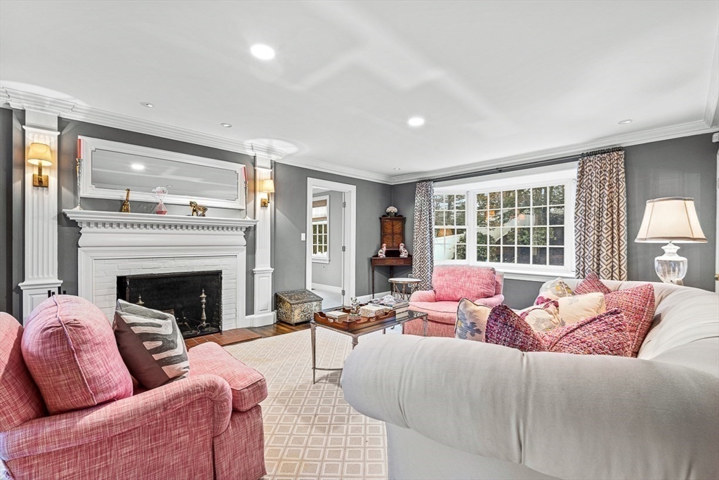 14 Rockridge Road Wellesley, MA 02481 - Photo 4 of 42 a living room with furniture large window and a fireplace