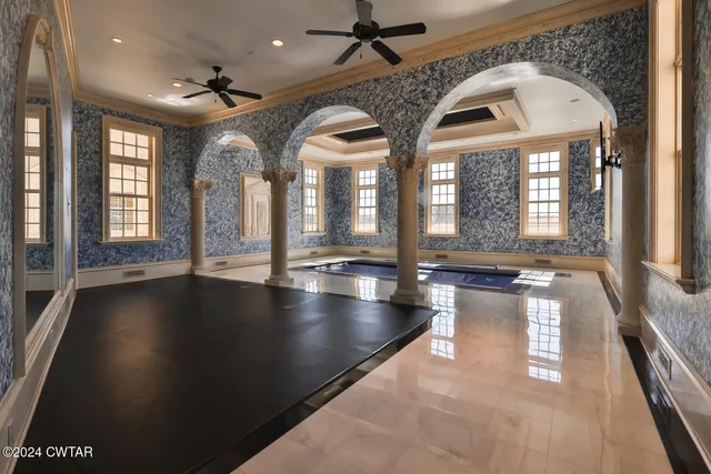a bathroom with a sink a vanity and a mirror