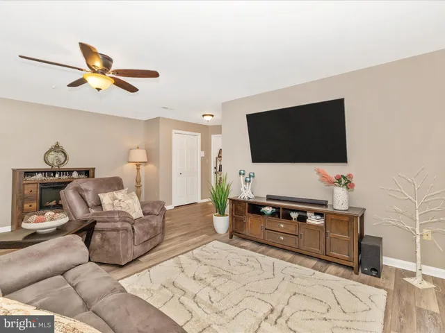 a kitchen with stainless steel appliances a refrigerator and a stove top oven
