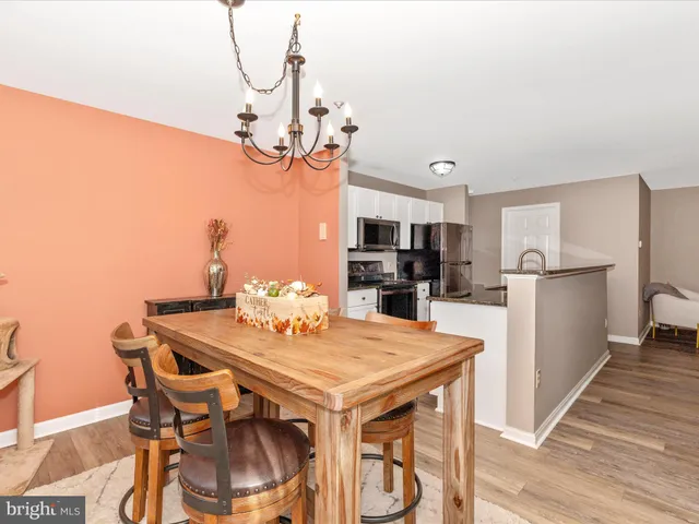 a bedroom with a bed and a television