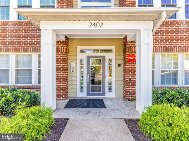 wooden floor in an empty room with stairs