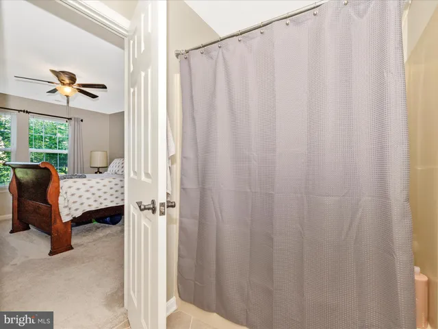 a view of a livingroom with furniture and a flat screen tv