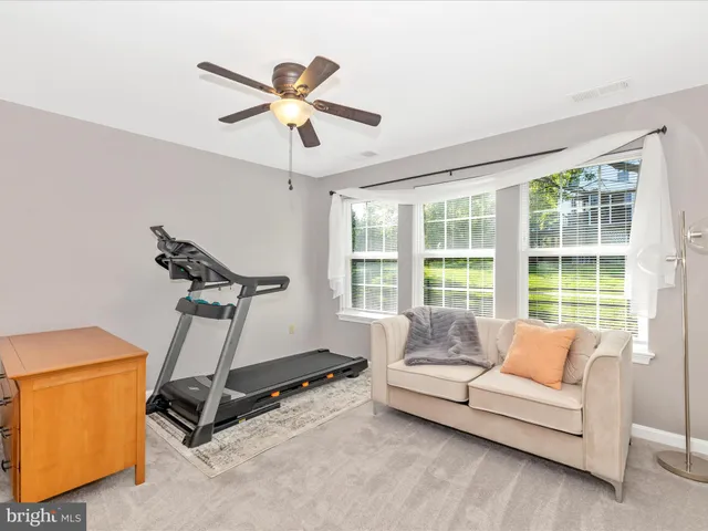 a view of a bathroom with a shower curtain