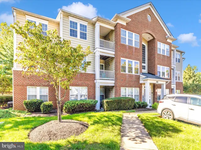a view of swimming pool with seating space
