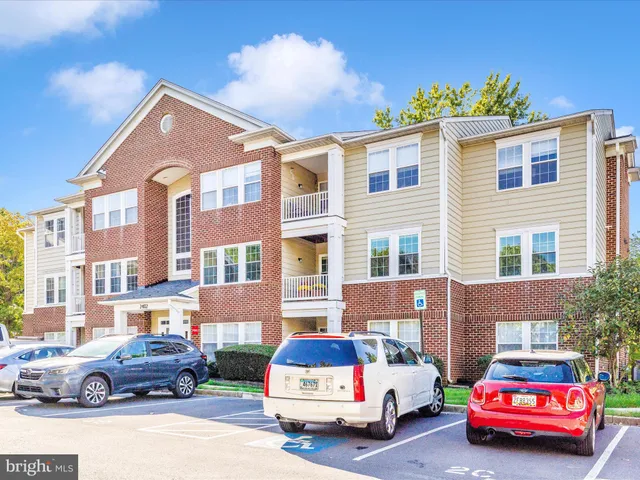 a view of a swimming pool with a yard and a fountain