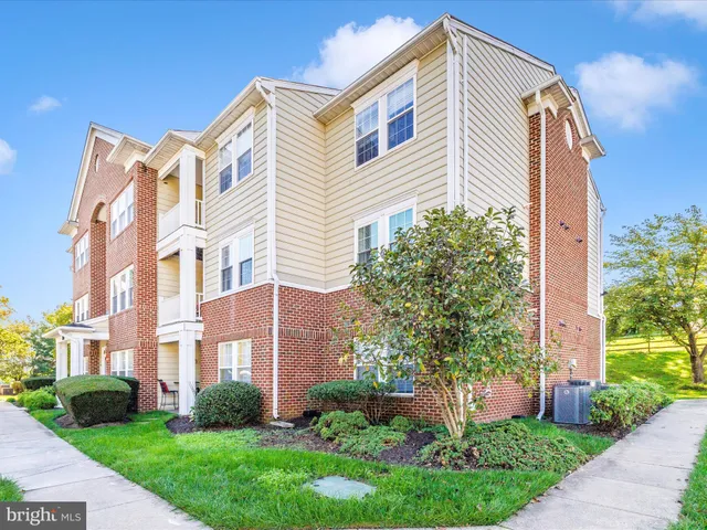 a view of a lake with a house