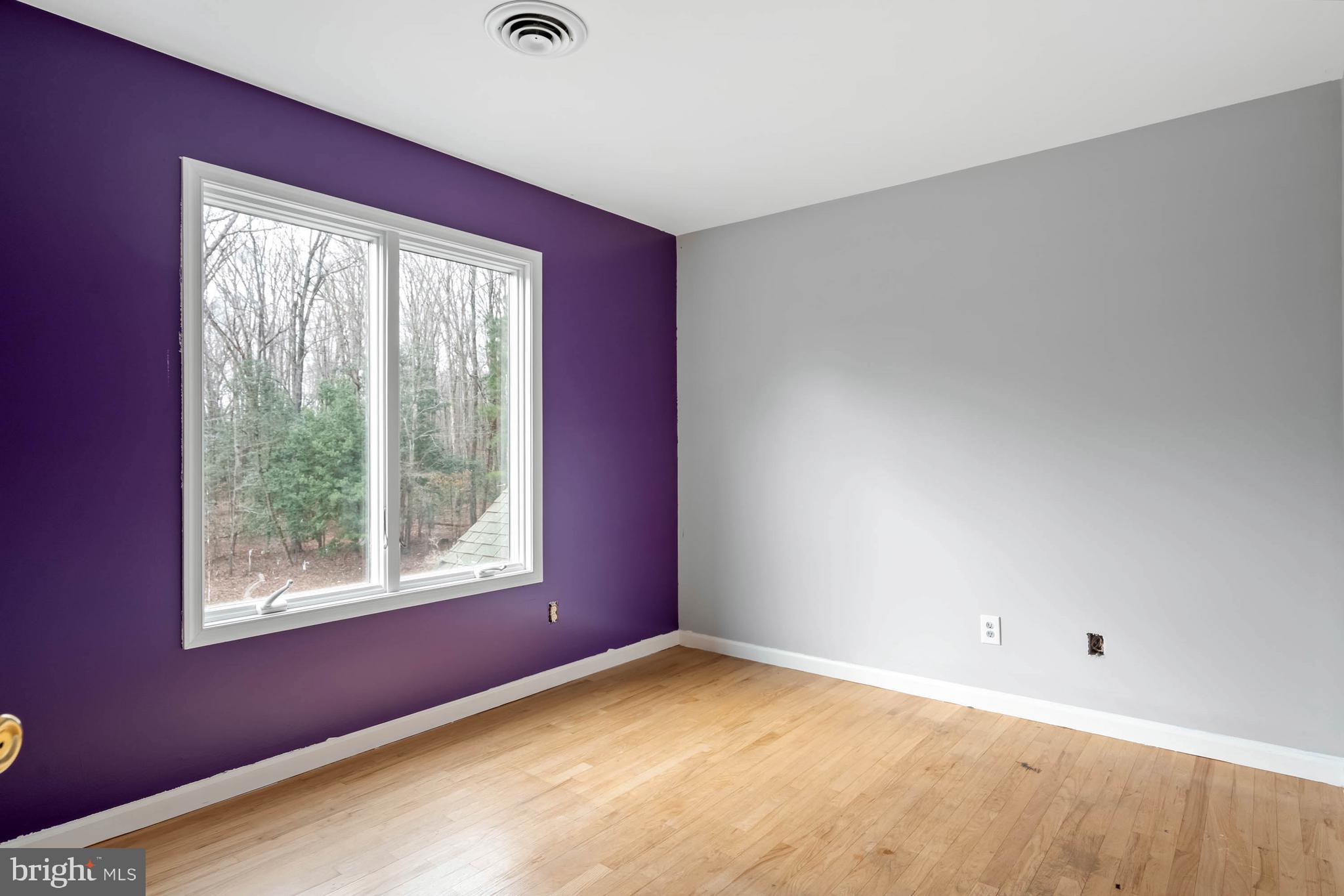 18885 Sand Hill Road Milton, DE 19968 - Photo 28 of 46 a view of an empty room with a window