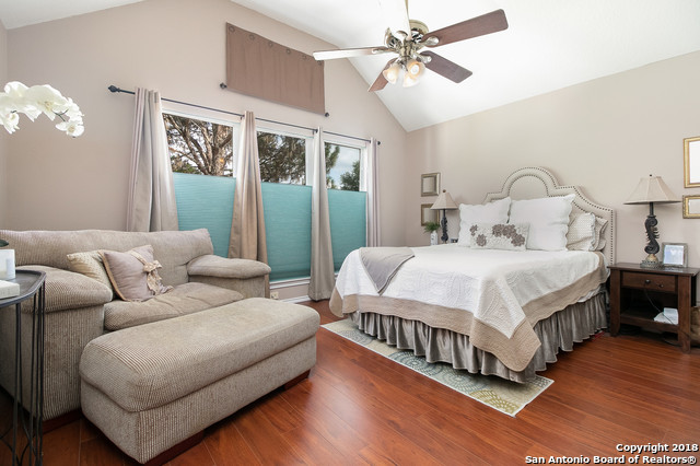 5858 Spring Square San Antonio, TX 78247 - Photo 14 of 21 a bedroom with a bed couch and window