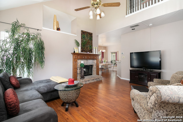 5858 Spring Square San Antonio, TX 78247 - Photo 7 of 21 a living room with furniture and a flat screen tv