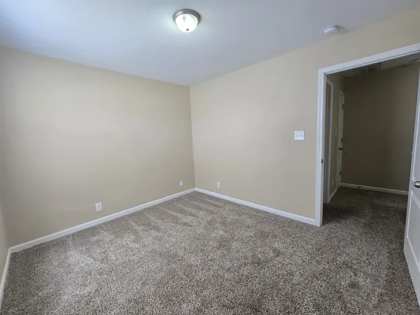 an empty room with an entryway