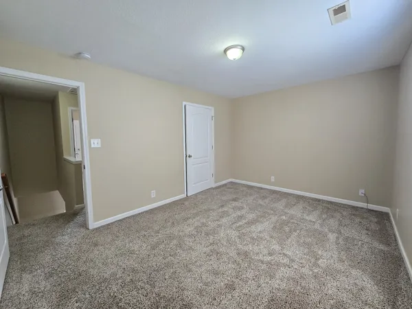 an empty room with a natural light