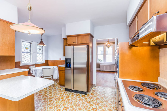 717 Selborne Road Riverside, IL 60546 - Photo 14 of 30 a kitchen with stainless steel appliances granite countertop a refrigerator and a stove