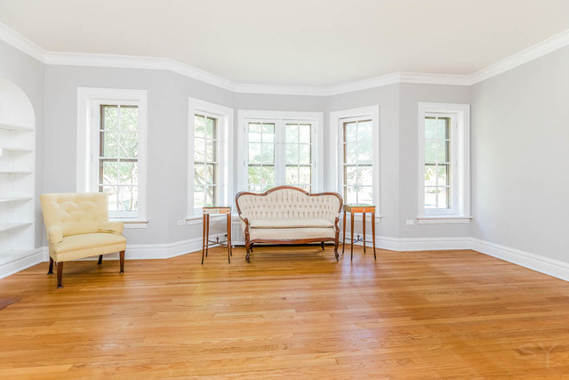 717 Selborne Road Riverside, IL 60546 - Photo 8 of 30 a living room with furniture and a table with wooden floor