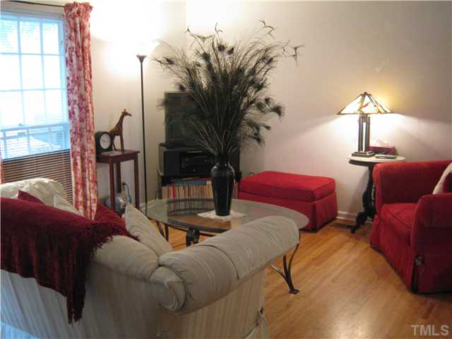 3806 Wester Road Raleigh, NC 27604 - Photo 2 of 12 Living room with hardwood floor with lovely open feeling to front yard!