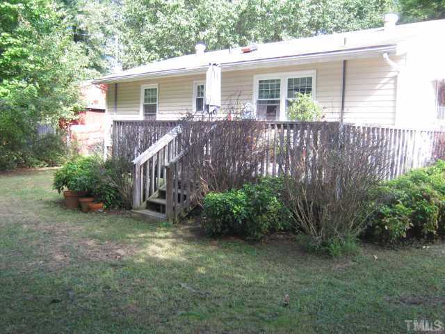 3806 Wester Road Raleigh, NC 27604 - Photo 10 of 12 View of large backyard, complete with deck. Lots of outdoor living and entertaining!