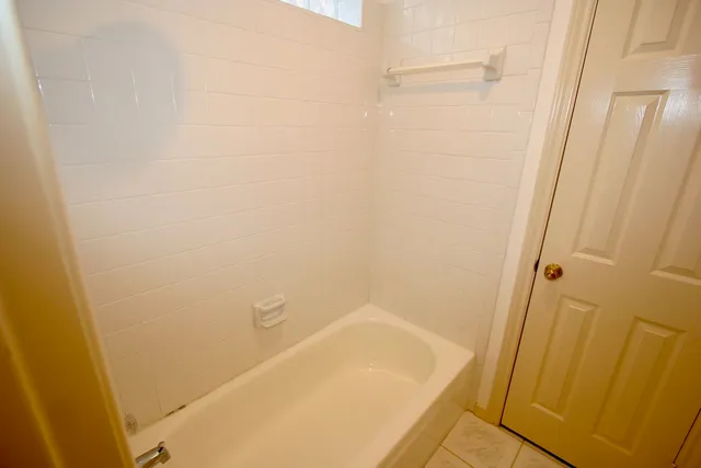 a bathroom with a bathtub