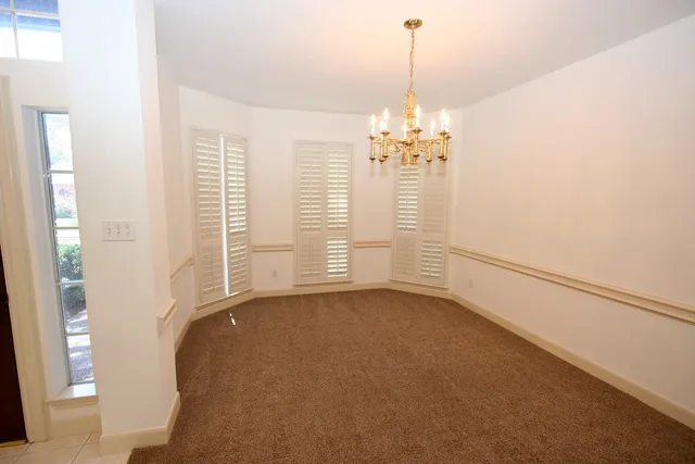 a view of a livingroom with a chandelier
