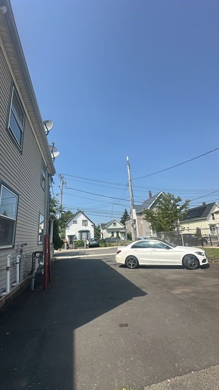 155 Cottage Street, Unit 2 Everett, MA 02149 - Photo 8 of 8 a view of a city street with cars