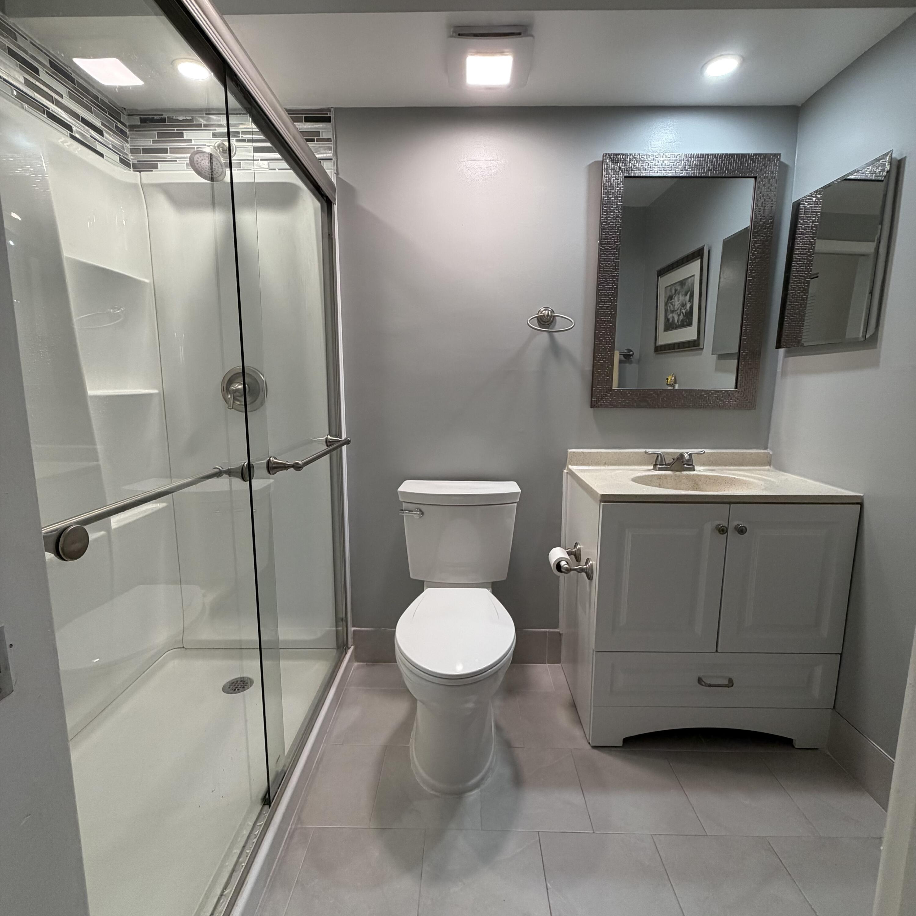 728 Normandy Lane, Unit P Delray Beach, FL 33484 - Photo 4 of 11 full bath with walk in shower