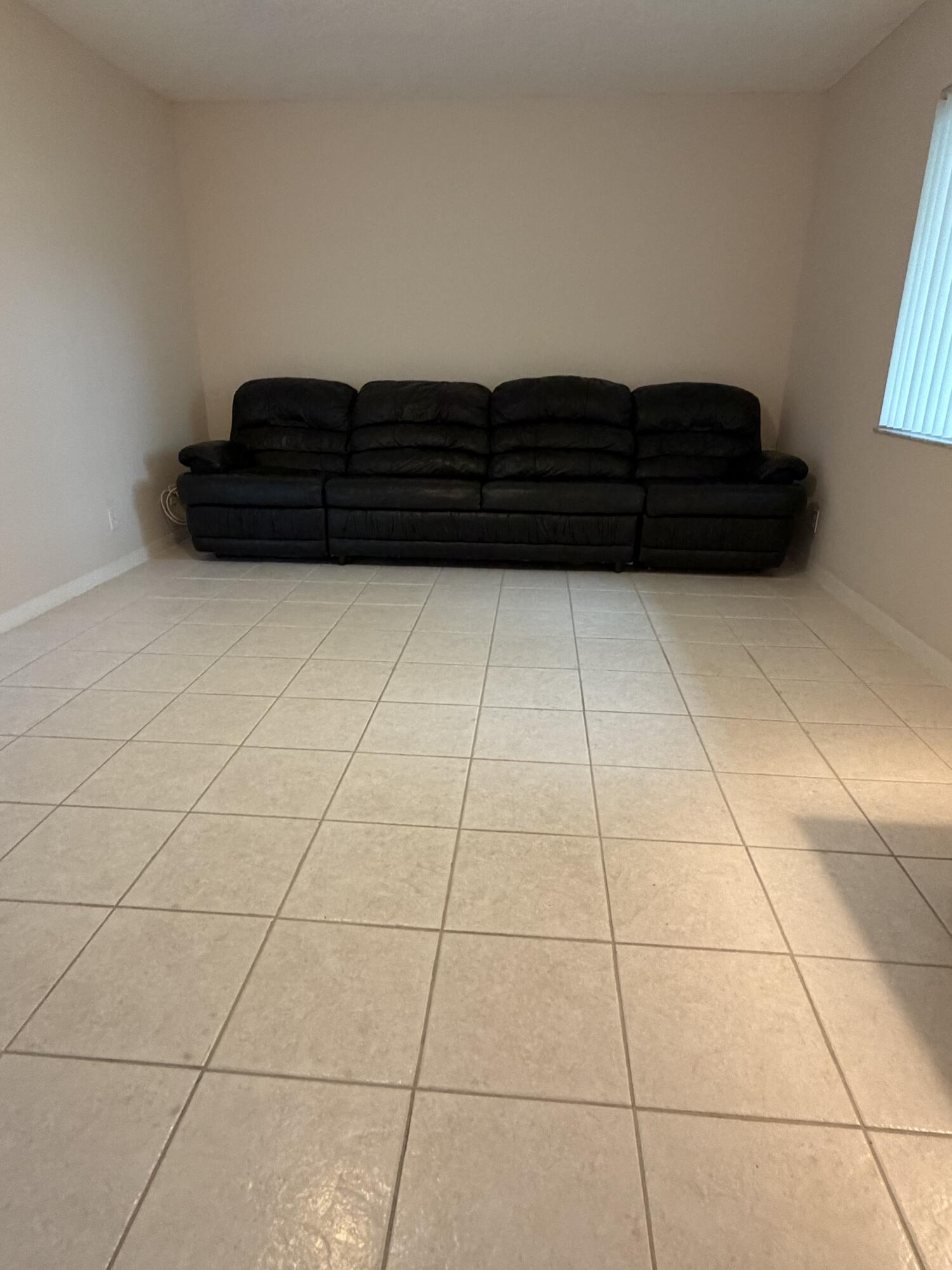 728 Normandy Lane, Unit P Delray Beach, FL 33484 - Photo 5 of 11 FAMILY ROOM